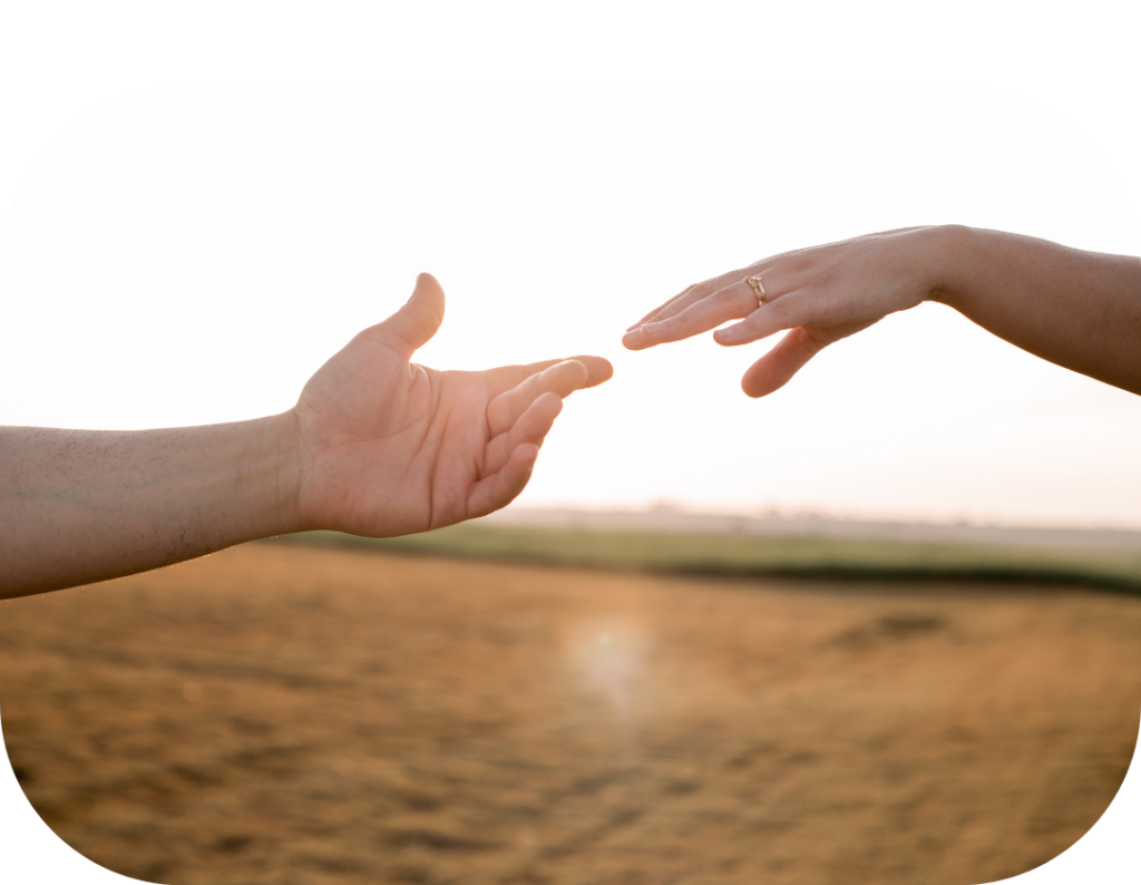 Deux mains qui se rejoignent, tendre la main à quelqu'un pour lui venir en aide